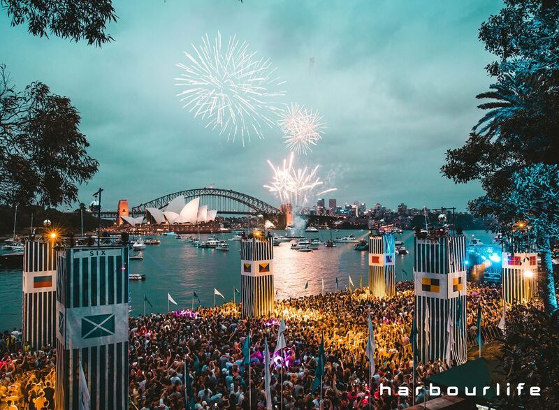 Australian outdoor music festival with crowd enjoying concert